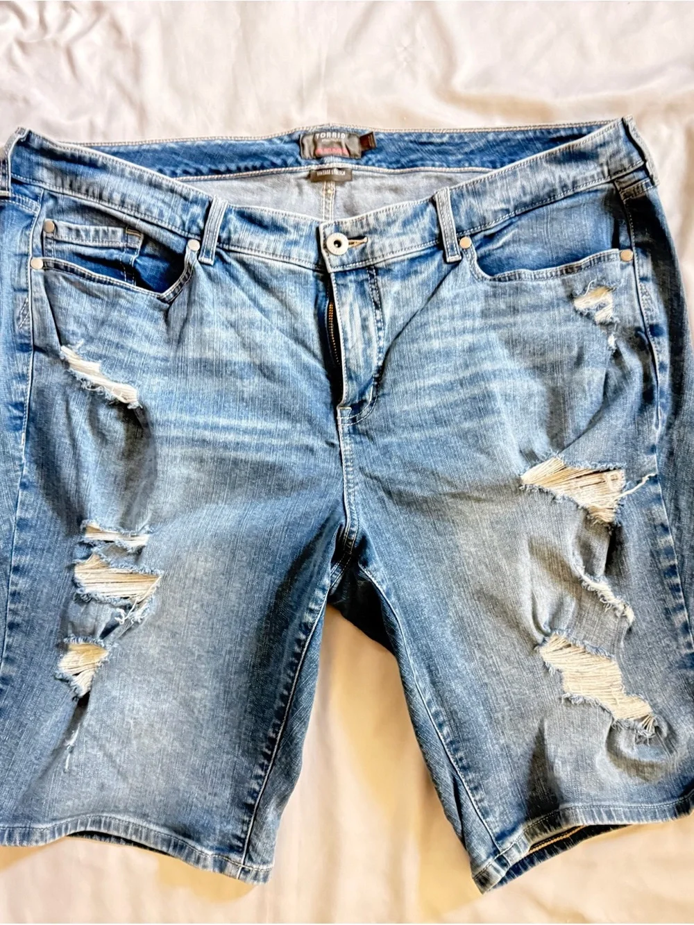 torrid light blue distressed denim shorts